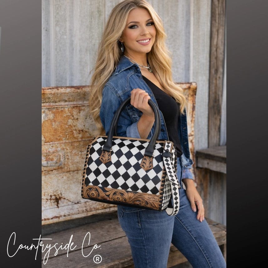 black and white checkered handbag with tooled accents
