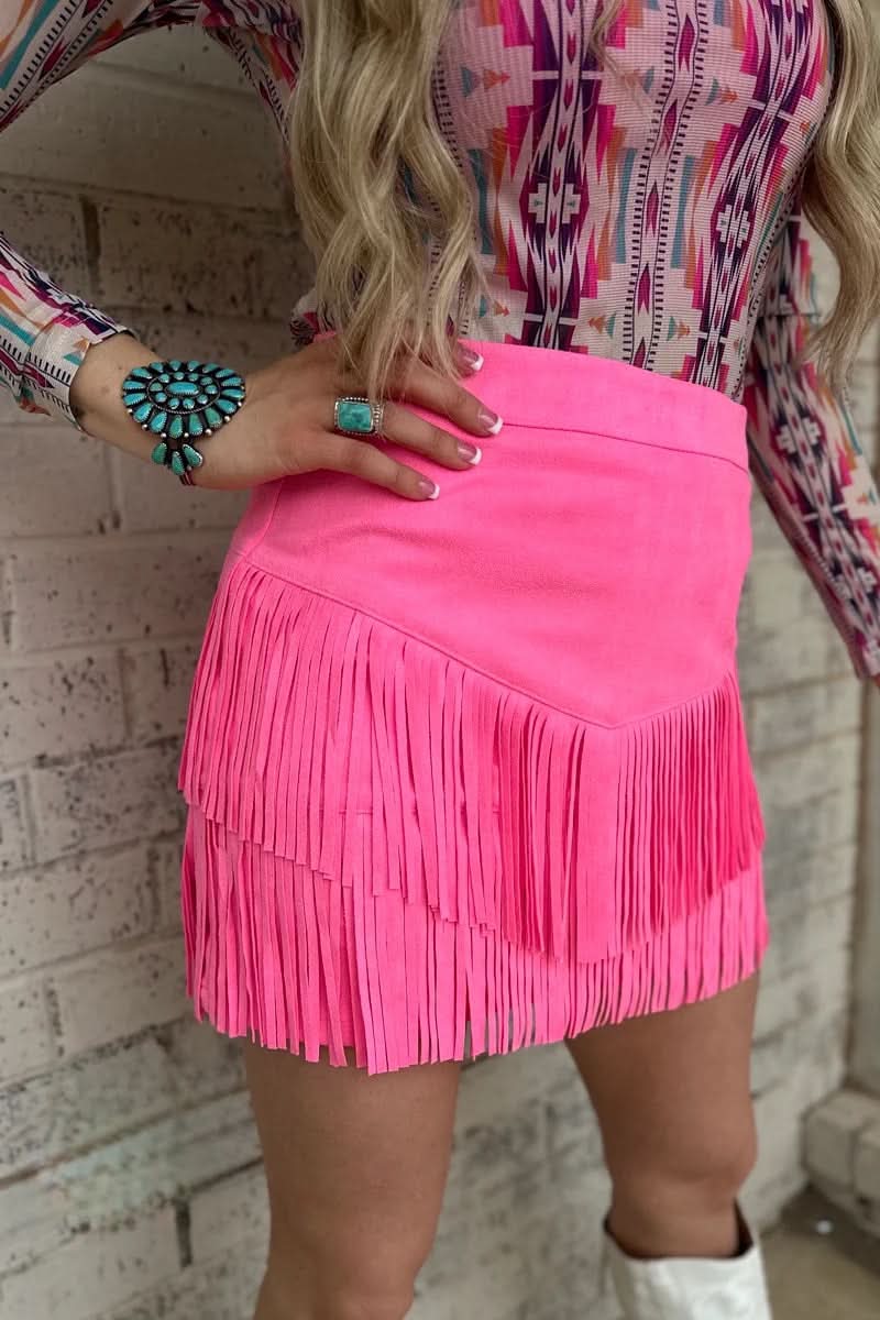 model wearing sterling kreek pink fringe skirt 