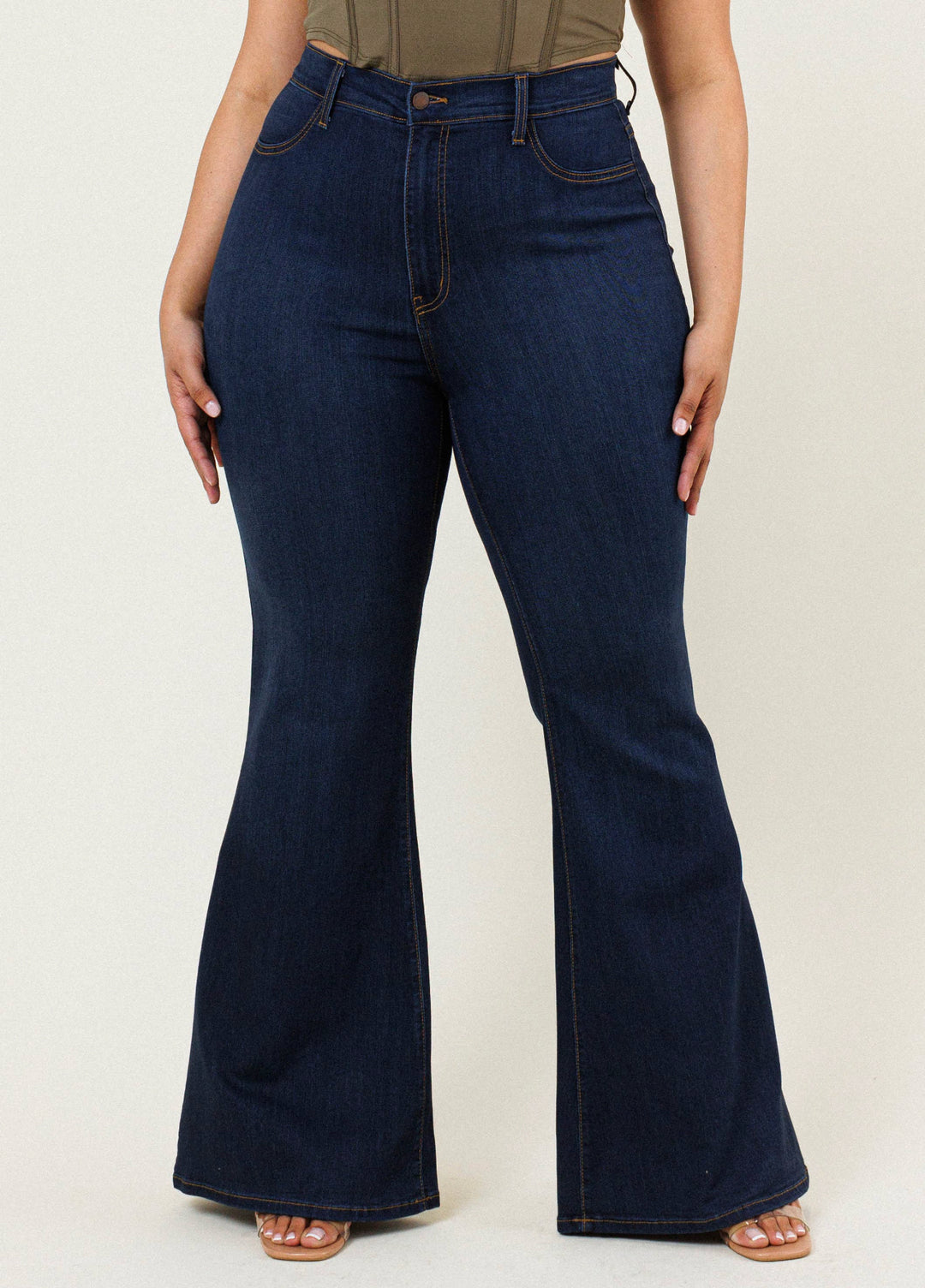 Plus Size Dark Wash High Rise Flared Jeans from Vibrant MIU