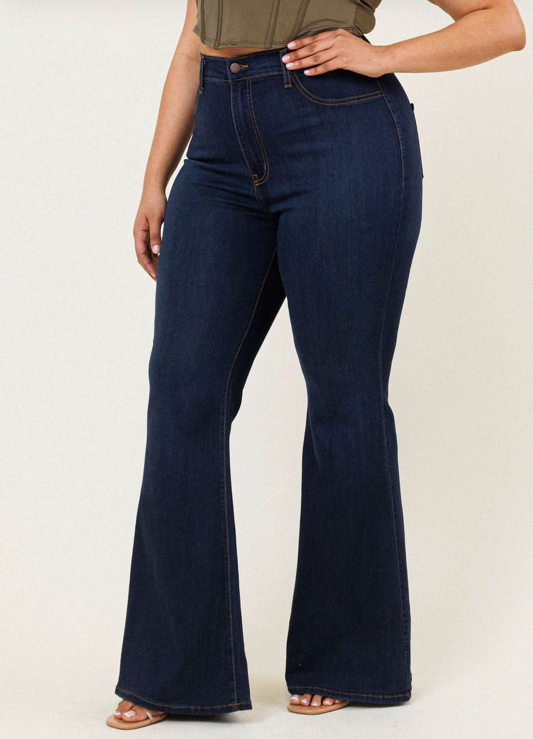 Plus Size Dark Wash High Rise Flared Jeans from Vibrant MIU